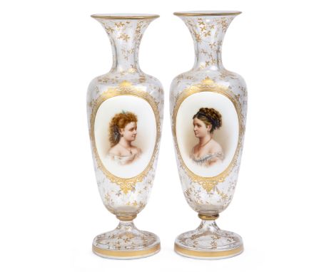 A pair of Bohemian glass vases, late 19th century, each with everted rim above an oval plaque with a hand-painted portrait of