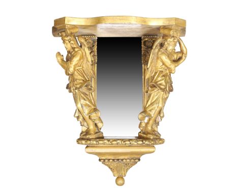 A Victorian giltwood and gesso mirror back wall bracket, second quarter 19th century, the shaped shelf above two carved angel