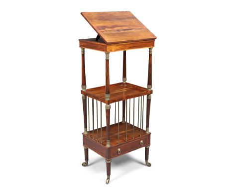 A Regency rosewood three tier whatnot music stand, first quarter 19th century,&nbsp;the hinged ratchet top above shelf and Ca