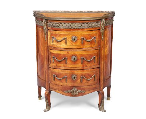 A Napoleon III kingwood demi-lune petit commode, third quarter 19th century, gilt metal mounted, the brass gallery top above 