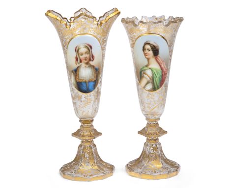 Two Bohemian glass vases, late 19th century, comprising: one of tapered form with everted petal cut rim over oval plaque hand