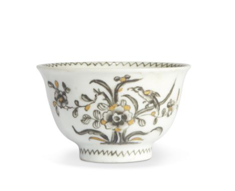 A Vienna (du Paquier) porcelain miniature bowl, c.1735, painted in Schwarzlot with flowering shrubs and enriched in gilding, 