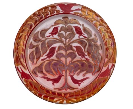 *An Aldermaston terracotta charger, decorated by Laurence McGowan the white body decorated in ruby lustre with three pairs of