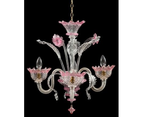 A Venetian clear and pink moulded glass three light chandelier, second half 20th century; the electrical fittings in dished d