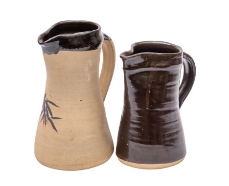 *Jeremy Leach [b.1941] two stoneware jugs: one of waisted form decorated with brushwork foliage beneath the spout, the rim an