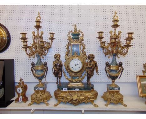 An Imperial gilt ormulu clock garniture A.F