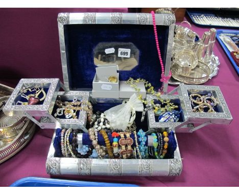 Assorted Costume Jewellery, including bracelets, earrings, Calvin Klein dress ring (boxed), etc contained in a Middle Eastern