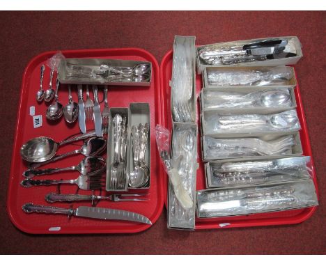 A Part Canteen of Oneida Plated Cutlery, including meat serving knife and fork, serving spoons, etc (boxed and loose):- Two T