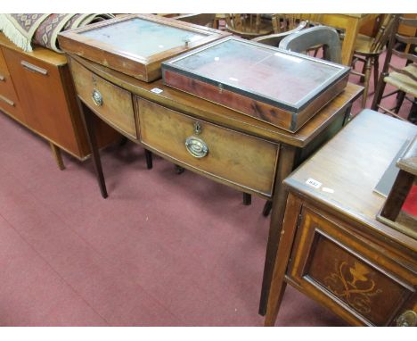 A XIX Century Mahogany Bow Front Side Table, with brass handles to twin drawers on tapering legs, 110.5cm wide.