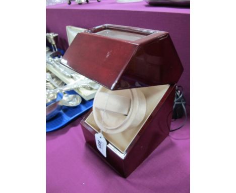 A Modern Automatic Single Watch Winder, mahogany effect with glazed panel, complete with cable/plug (electrically untested).