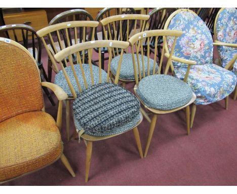 Ercol Set of Four Spindle Back Dining Chairs, bearing labels, on splayed legs, 79cm high,