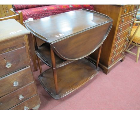 Elm Tea Trolley, in the Ercol manner with fall leaves, galleried trays united by tapering supports.