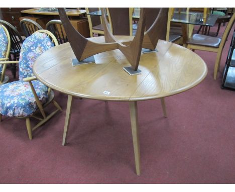 Ercol Drop Leaf Dining Table, on splayed legs. the top 124.5 x 112cm when open, bearing label.