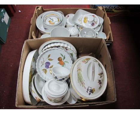 A Large Quantity of Royal Worcester 'Evesham' Oven To Table Pottery, including tureens, flan dishes, biscuit jar, serving dis