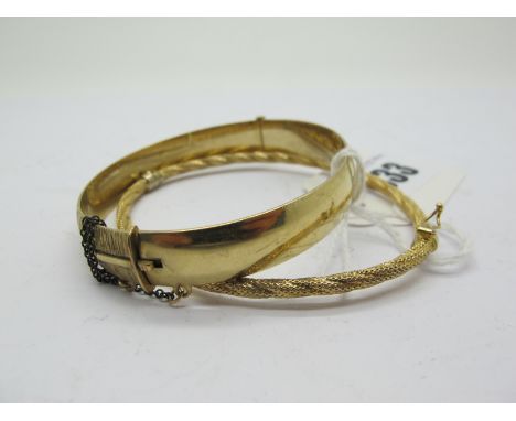 A 9ct Gold Textured Bangle, spring hinged (internal diameter 6.2cm) (overall weight 3.6g); together with a wide textured bang