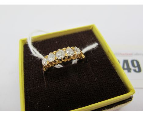 An 18ct Gold Five Stone Diamond Ring, graduated claw set with old cut stones, (hallmarks part worn) (finger size N) (3g).