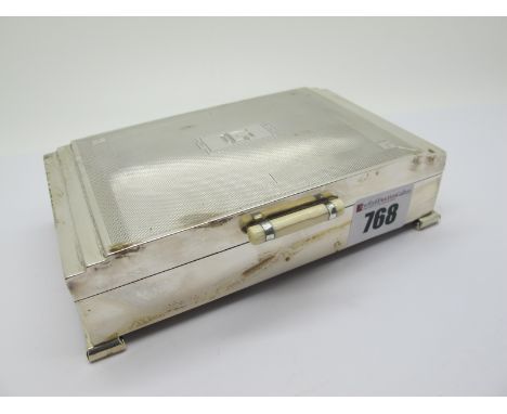 An Art Deco Hallmarked Silver Cigarette Box, the stepped hinged lid with engine turned decoration and initials "LG", base 15.