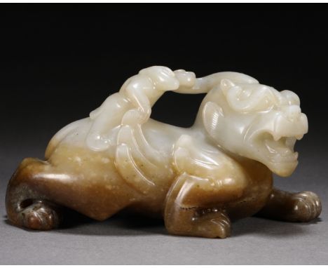 A ChineseCarved Jade Figure with Mythical Beast Han Dynasty H 6.5cm; W 13cm; 551g