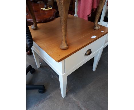 A LIGHT WOOD AND WHITE TABLE WITH DRAWER