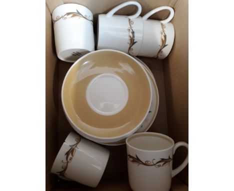 A BOX OF SUSIE COOPER CUPS AND SAUCERS