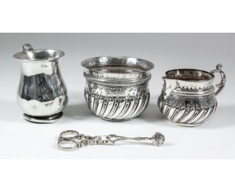 A late Victorian silver circular sugar basin with part reeded and fluted body stamped with leaf ornament, 3.5ins diameter x 2