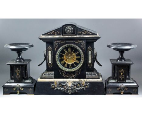 A late 19th Century French three piece clock garniture by Wales &amp; McCulloch of Paris, the 5ins diameter black chapter rin