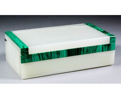 A George V onyx and malachite cigarette box of Art Deco design, 6.75ins x 4ins x 2.25ins high, with a silver hinge hallmarked