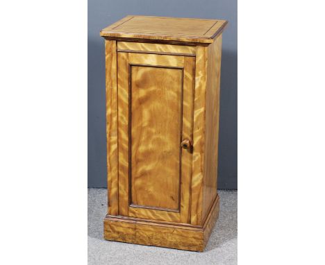 A late Victorian satin walnut bedside cabinet by Holland &amp; Sons, for a Royal residence, the top with rounded front corner