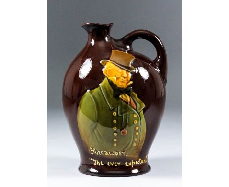 A Royal Doulton "Kingsware" pottery whisky flask made for Dewar's Whisky, the front decorated with half length portrait of "M