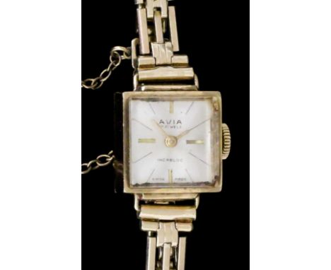 A Lady's 9ct gold cased cocktail wristwatch by Avia, the 15mm square dial with baton numerals contained in plain case on conf