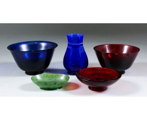 A Chinese ruby glass small bowl, 3.75ins (9.5cm) diameter x 2ins (5.1cm) high (signed), a similar blue glass bowl, 4ins (10.2