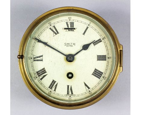 A 20th Century brass cased ships bulkhead clock by Smith, the 5.5ins white painted dial with Roman numerals, to the eight day