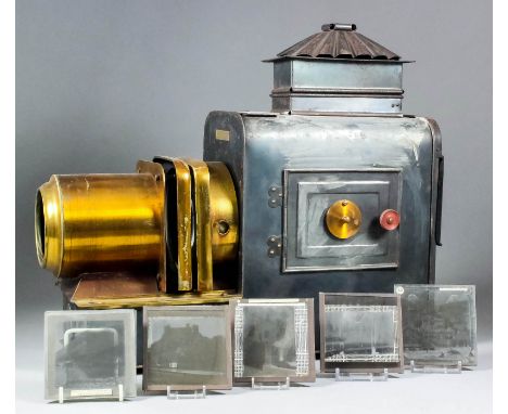 A late 19th Century black japanned metal and lacquered brass magic lantern by City Sale and Exchange, 26 and 28 Kings Road, S