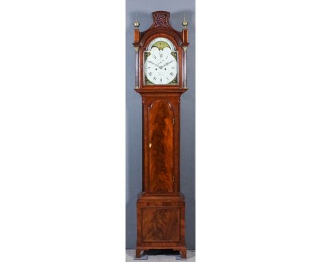 An early 19th Century mahogany longcase clock by Broderick of Boston, the 12ins arched painted dial with Roman and Arabic num