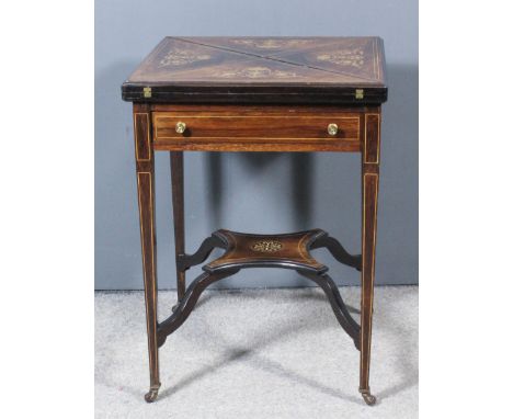 An Edwardian rosewood square envelope card table, the whole inlaid with stringings, the top inlaid with leaf scroll ornament,