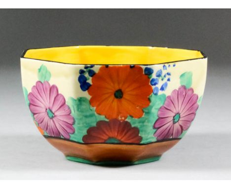 A Clarice Cliff "Fantasque" pottery octagonal bowl painted with "Gayday" pattern, 5.125ins diameter x 2.75ins high, Wilkinson
