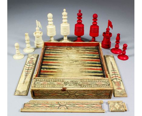 A 19th Century carved and painted bone "Prisoner of War" type backgammon, chess and cribbage set, with backgammon and chess b