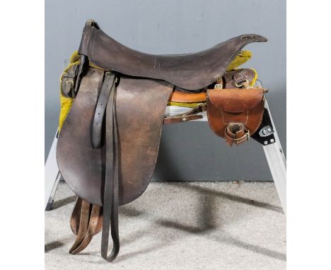 An early 20th Century British Army cavalry saddle with spare horseshoe pouch