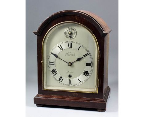 An early 20th Century German mahogany cased mantel clock exhibited by Kleyser &amp; Co, 31 High Street Boro. London, the arch