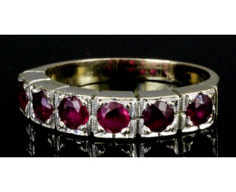 A 18ct gold mounted six stone ruby half hoop eternity ring (approximate total ruby weight 1.5ct) (size J - gross weight 3.2 g