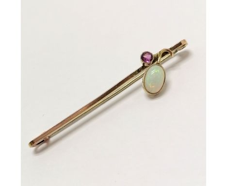 Antique 9ct marked gold brooch set with opal &amp; purple stone - 5cm long &amp; 1.8g total weight 