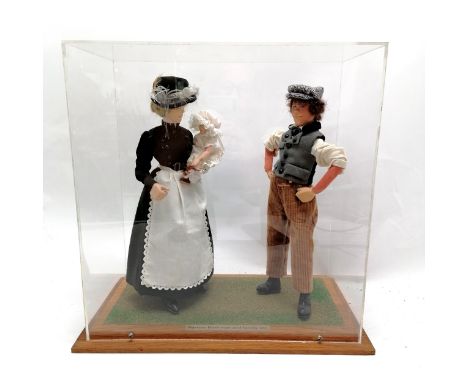 Scale model figures of a 'Narrow Boat-man and family 1890' in a Perspex case 36cm x 19cm x 38cm high 