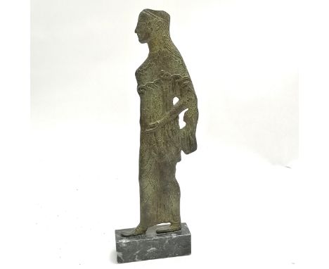 Unusual bronze casting of a classical figure in profile on a black and white marble base - 28.5cm high and has monogram near 