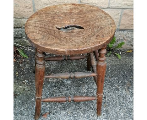 Antique country oval pierced seat Elm stool, on turned supports, and turned splayed legs, 36.5 cm wide, 29 cm deep, 48 cm hig