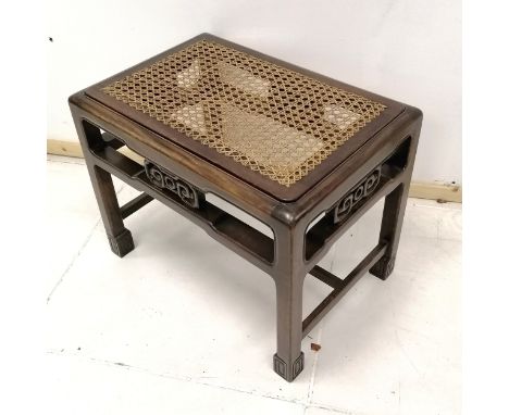 Oriental hardwood dressing table stool, with canework drop in seat, on square carved legs, 56 cm wide, 38 cm deep, 45 cm high