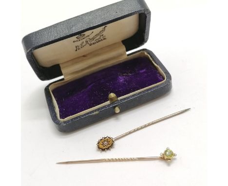 2 x 15ct marked gold antique stick pins - 1 set with diamond, other set with peridot &amp; pearl ~ total weight 2.6g and in a