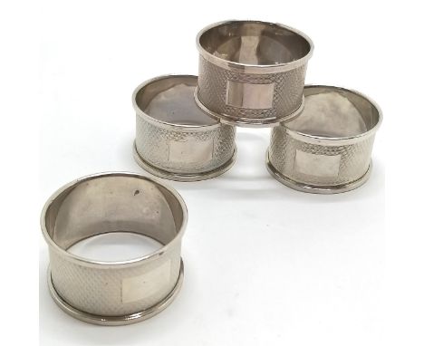 1987 silver set of 4 x engine turned napkin rings by W I Broadway &amp; Co - 61g and are all undedicated 