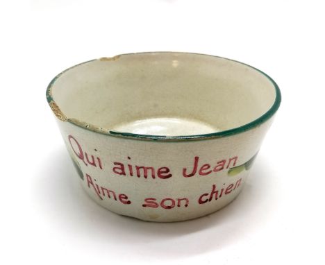 Wemyss antique dog bowl with French inscription 'Qui aime Jean aime son chien' - 12cm diameter &amp; has some obvious damage 