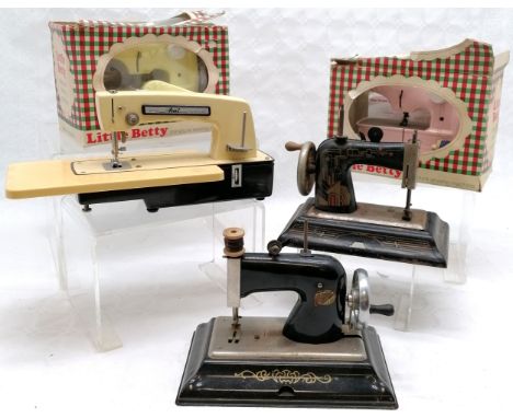 Collection Of Vintage child's sewing machines, to include Boxed Little Betty in yellow, another in pink, Black Eagle , comet 