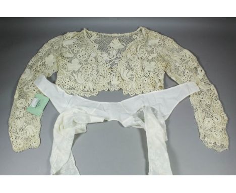 An early 19th Century Carrick-Ma-Cross bolero with later pearl button fastening, 34ins x 12ins deep, a late 18th Century "Hab